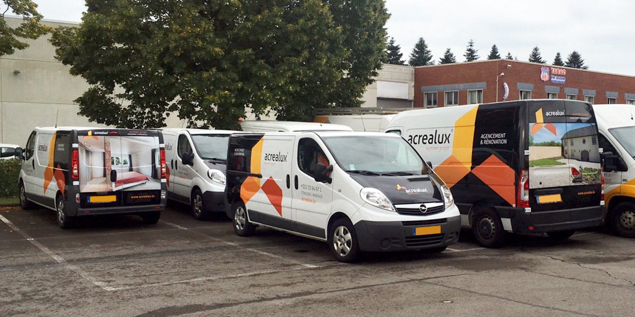 Impression de vinyle appliqué sur l'escalator du centre Knauf à Pommerloch